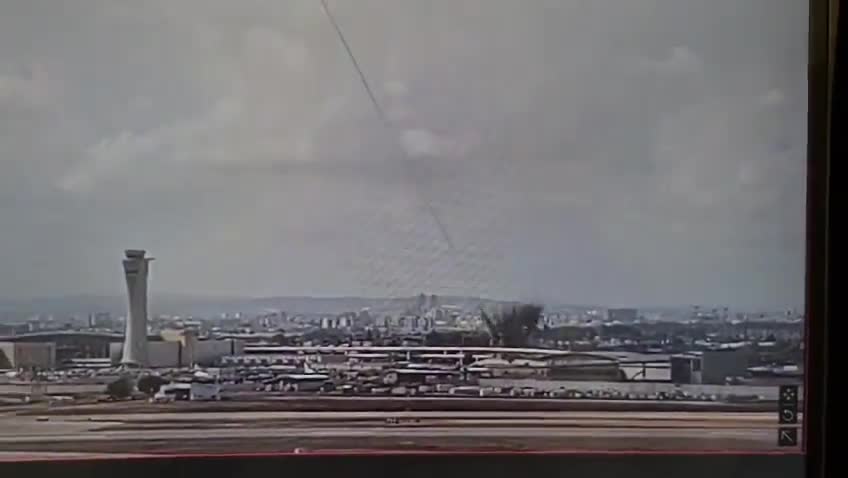 The moment a ballistic missile launched by Yemeni Houthis hit an area very close to Israel's Ben Gurion airport this morning