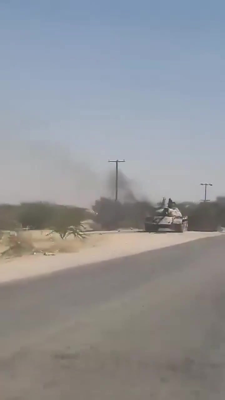 A tank belonging to the Southern Transitional Council (STC) forces is burning after a Saudi airstrike in al-Khash'ah. Reports indicate airstrikes targeting STC positions, including the 37th Armored Brigade camp in al-Khash'ah, and a mass exodus of STC fighters.