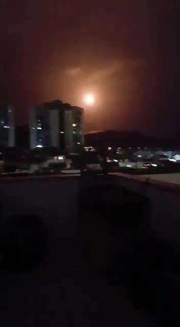 What may be a missile interceptor explodes near a building in Eilat, Israel due to a drone infiltration, likely from Yemen